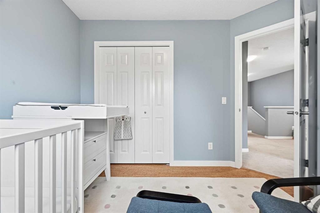 14 River Heights Crescent, Cochrane, AB - Indoor Photo Showing Bedroom