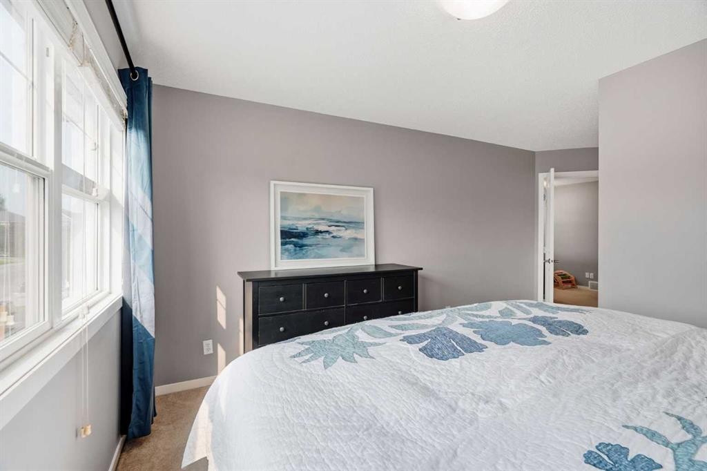 14 River Heights Crescent, Cochrane, AB - Indoor Photo Showing Bedroom