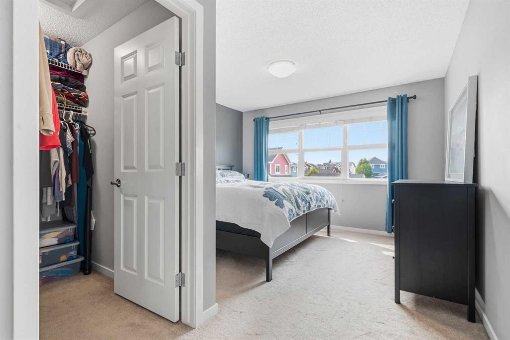14 River Heights Crescent, Cochrane, AB - Indoor Photo Showing Bedroom