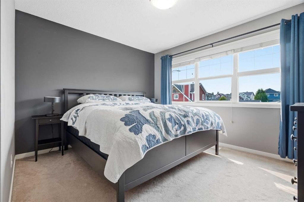 14 River Heights Crescent, Cochrane, AB - Indoor Photo Showing Bedroom