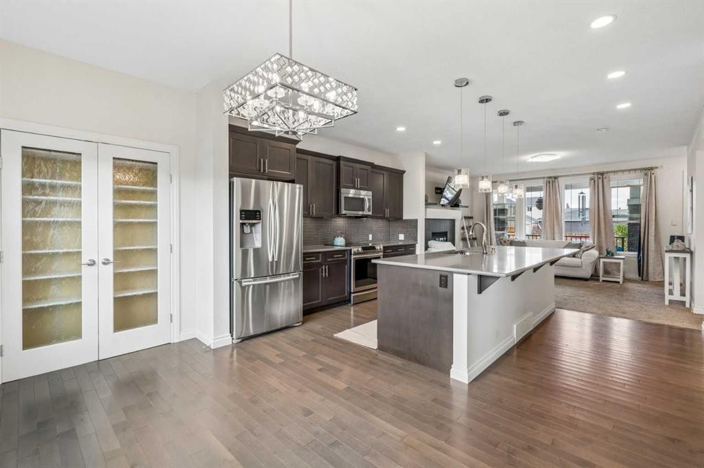 11 Legacy Crescent Se, Calgary, AB - Indoor Photo Showing Kitchen With Stainless Steel Kitchen With Upgraded Kitchen