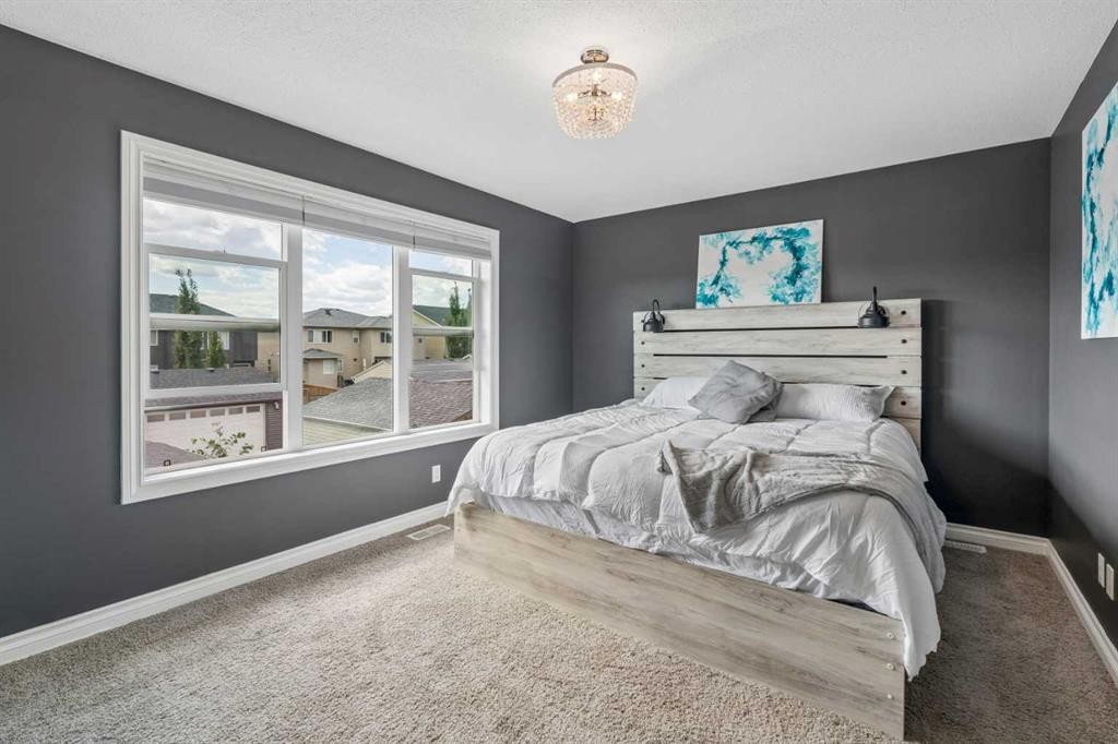 11 Legacy Crescent Se, Calgary, AB - Indoor Photo Showing Bedroom