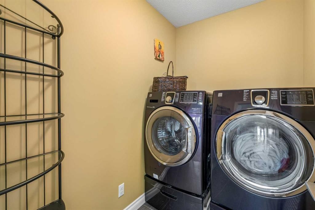 11 Legacy Crescent Se, Calgary, AB - Indoor Photo Showing Laundry Room