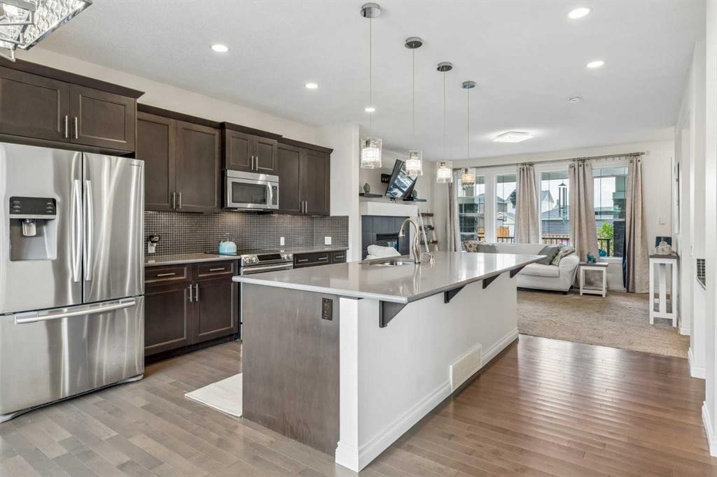 11 Legacy Crescent Se, Calgary, AB - Indoor Photo Showing Kitchen With Stainless Steel Kitchen With Upgraded Kitchen