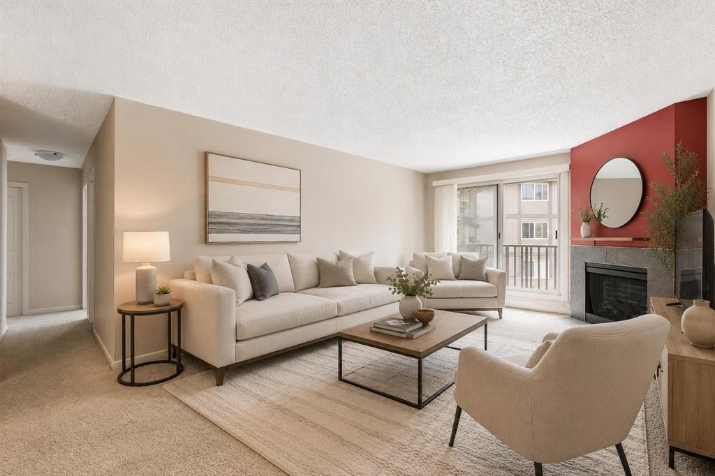 522-6400 Coach Hill Road Sw, Calgary, AB - Indoor Photo Showing Living Room With Fireplace