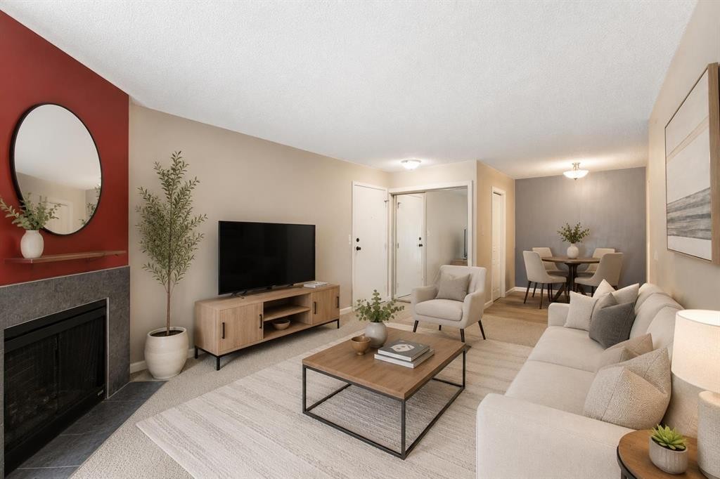 522-6400 Coach Hill Road Sw, Calgary, AB - Indoor Photo Showing Living Room With Fireplace