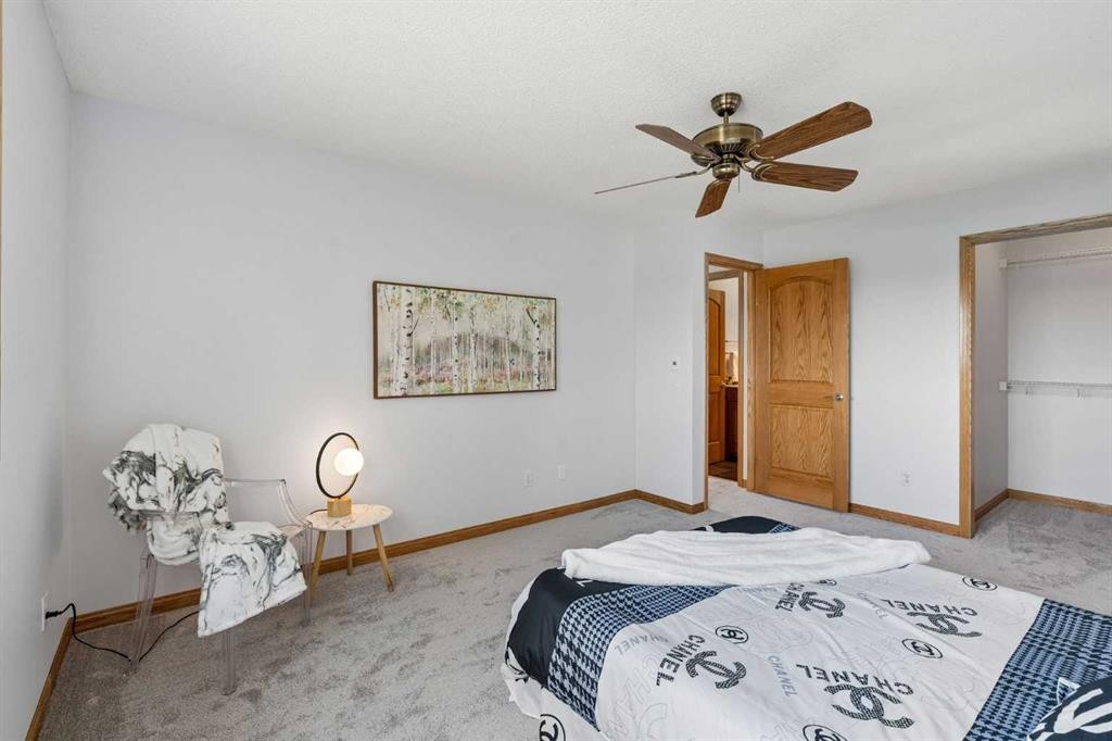 246 Mt Lorette Place Se, Calgary, AB - Indoor Photo Showing Bedroom