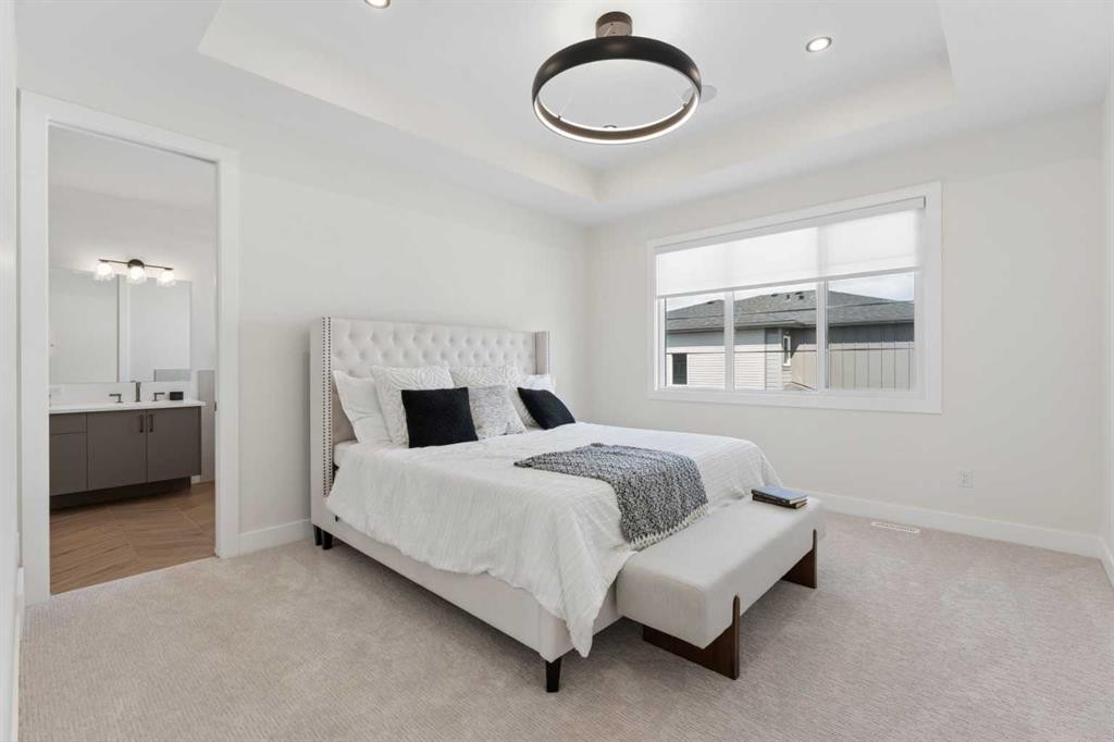 507 Waterford Rise, Chestermere, AB - Indoor Photo Showing Bedroom