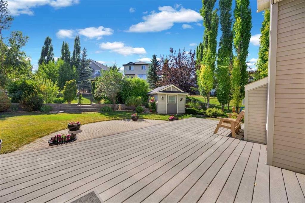146 Springborough Point Sw, Calgary, AB - Outdoor With Deck Patio Veranda