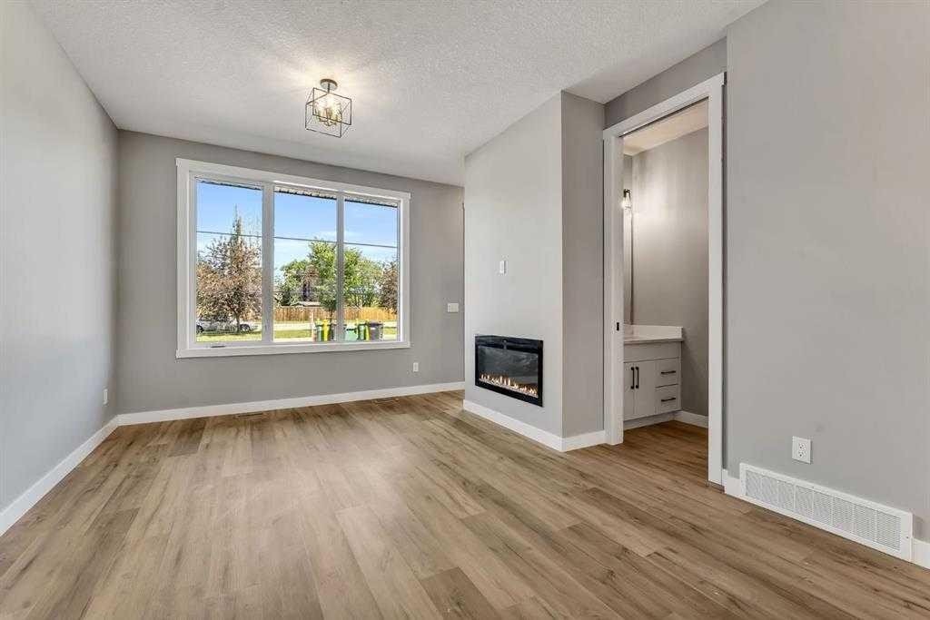 28A Green Meadow Crescent, Strathmore, AB - Indoor With Fireplace