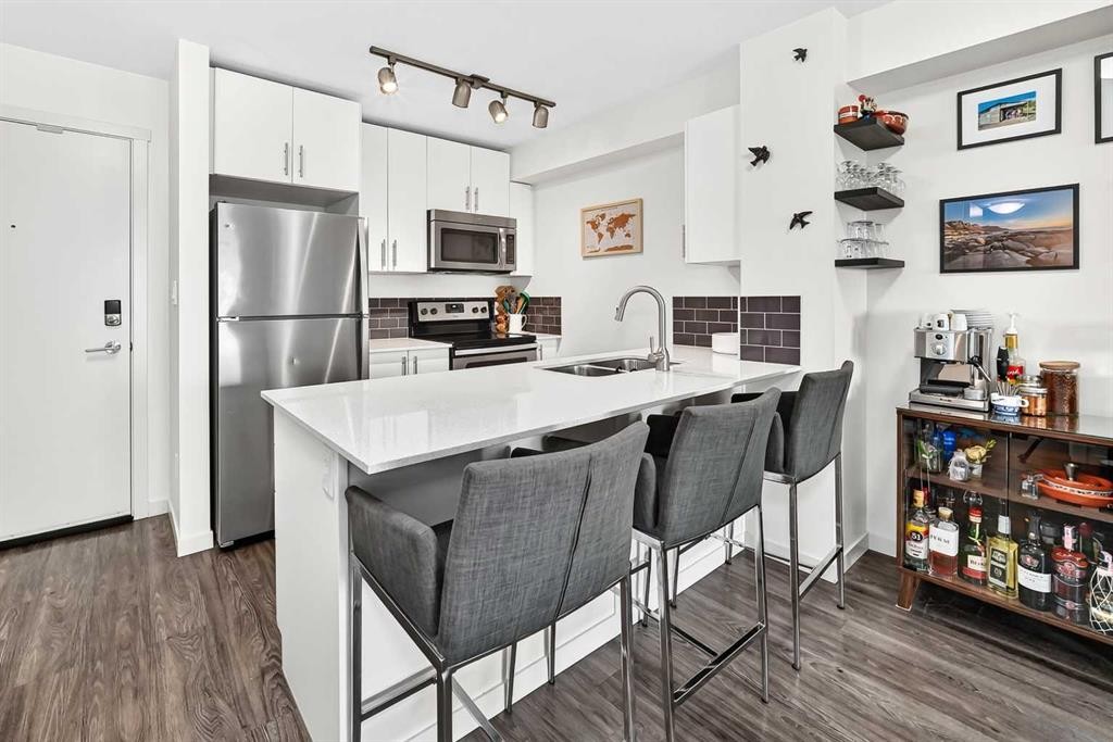 1406-181 Skyview Ranch Manor Ne, Calgary, AB - Indoor Photo Showing Kitchen With Stainless Steel Kitchen With Double Sink
