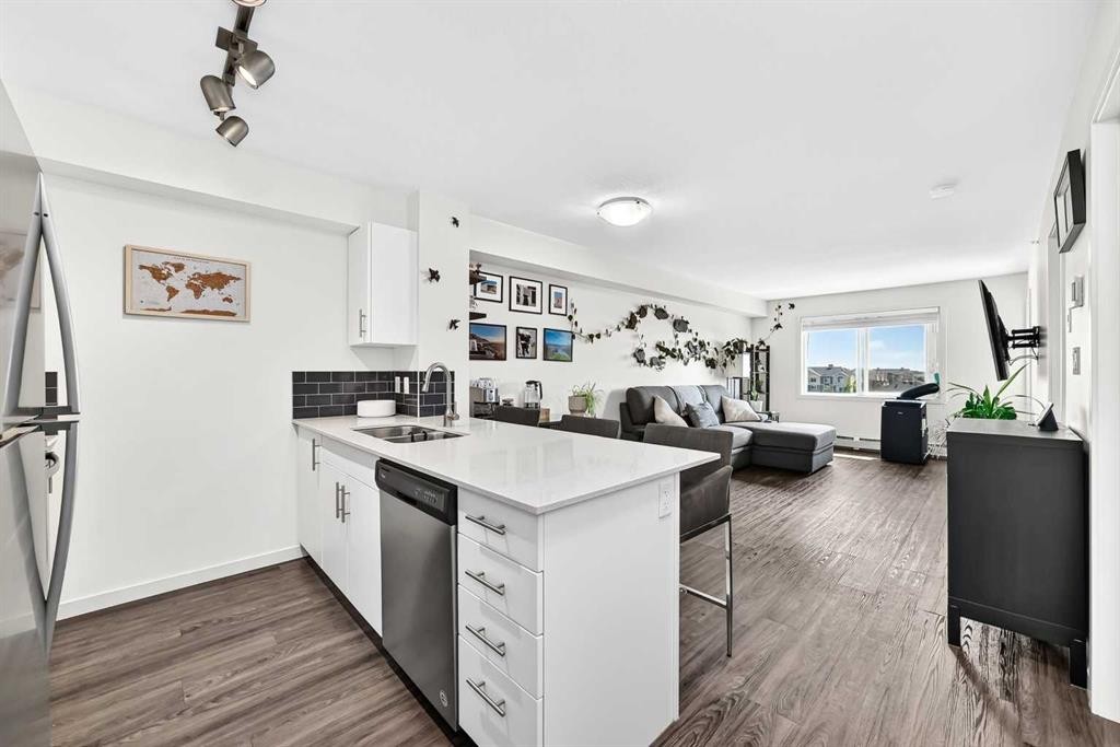 1406-181 Skyview Ranch Manor Ne, Calgary, AB - Indoor Photo Showing Kitchen With Double Sink