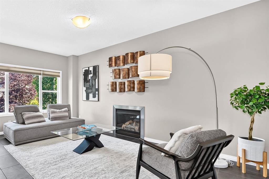 325 Kincora Glen Rise Nw, Calgary, AB - Indoor Photo Showing Living Room With Fireplace