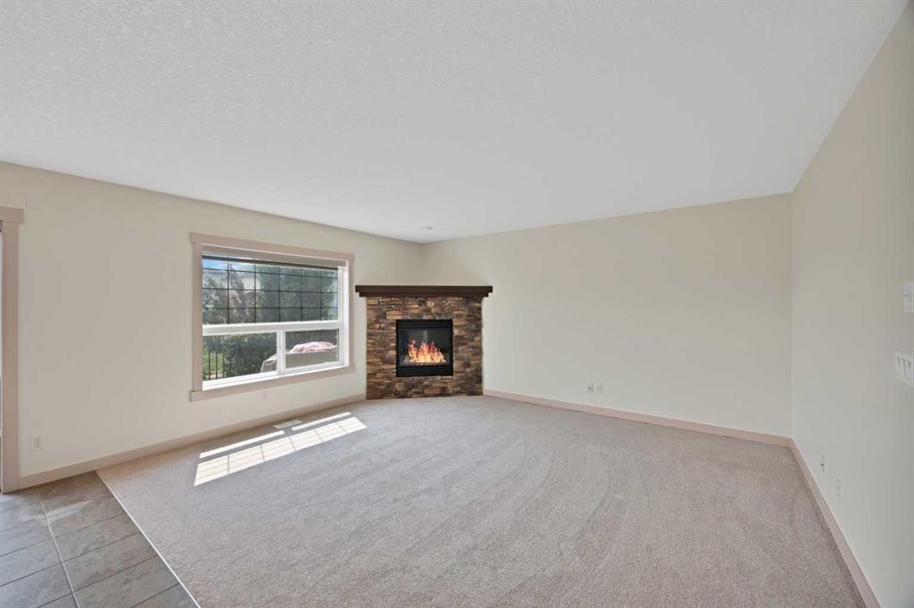 130 Panamount Road Nw, Calgary, AB - Indoor With Fireplace