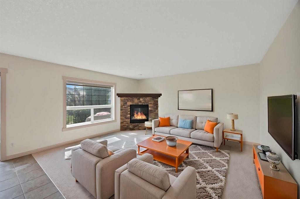 130 Panamount Road Nw, Calgary, AB - Indoor Photo Showing Living Room With Fireplace