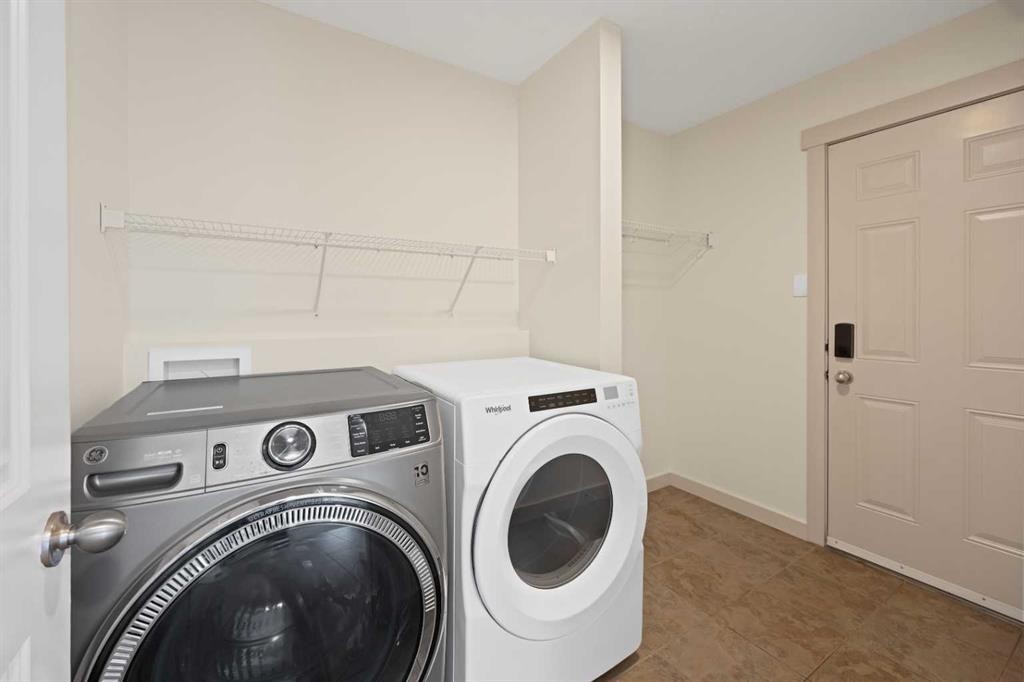 130 Panamount Road Nw, Calgary, AB - Indoor Photo Showing Laundry Room
