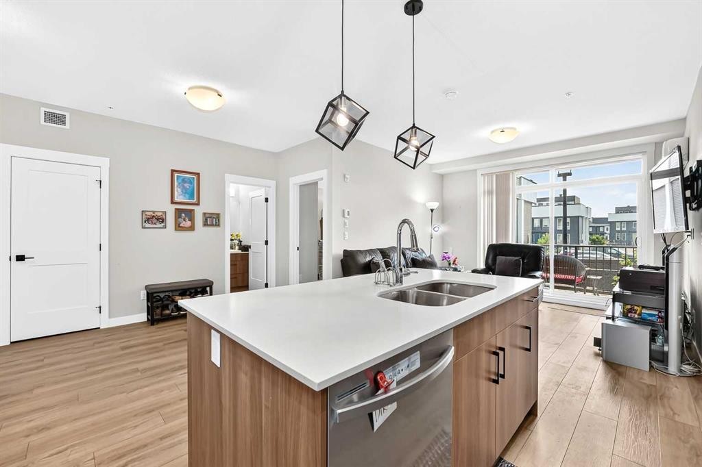 6106-200 Seton Circle Se, Calgary, AB - Indoor Photo Showing Kitchen With Double Sink