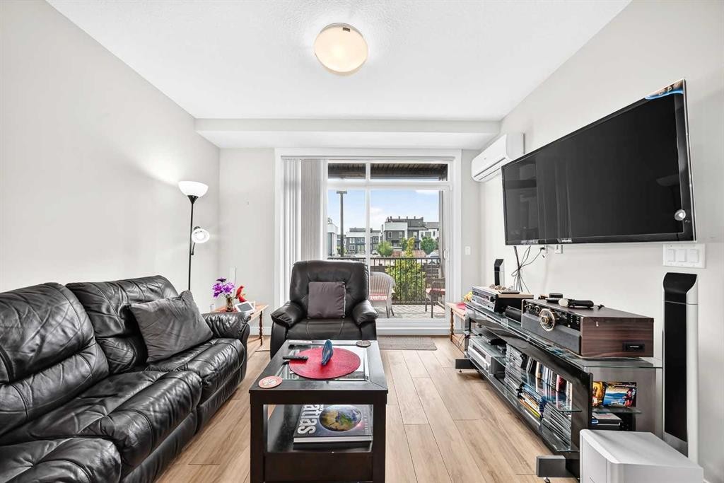 6106-200 Seton Circle Se, Calgary, AB - Indoor Photo Showing Living Room