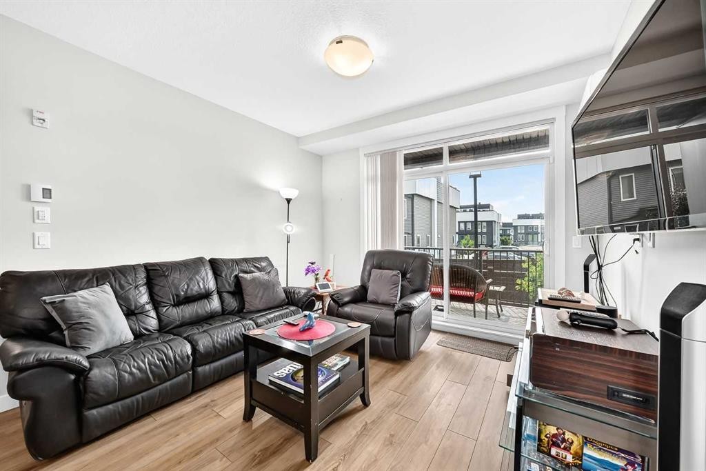 6106-200 Seton Circle Se, Calgary, AB - Indoor Photo Showing Living Room