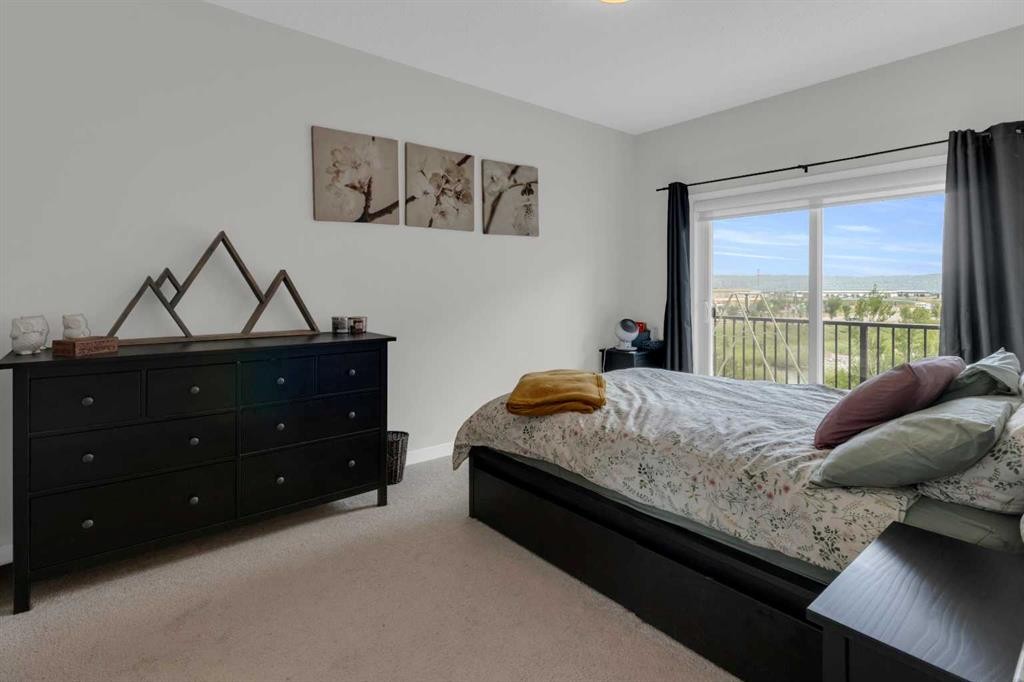 205-250 Fireside View, Cochrane, AB - Indoor Photo Showing Bedroom
