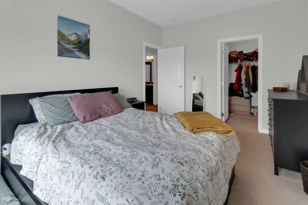 205-250 Fireside View, Cochrane, AB - Indoor Photo Showing Bedroom