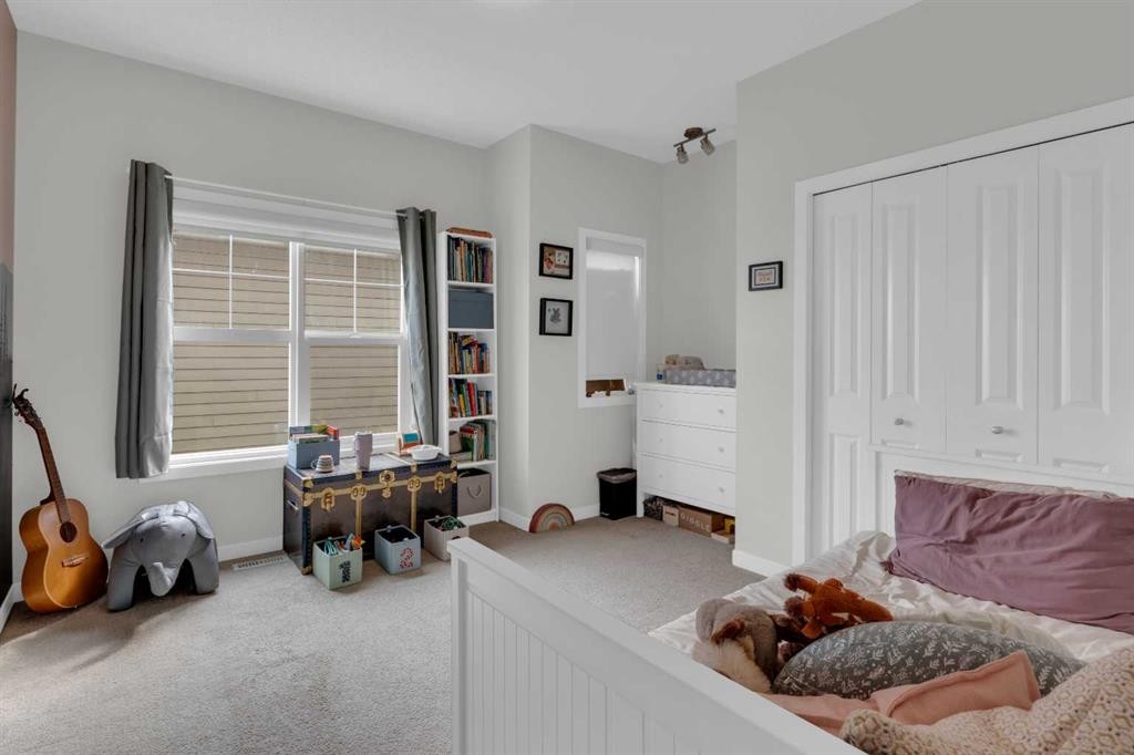 205-250 Fireside View, Cochrane, AB - Indoor Photo Showing Bedroom