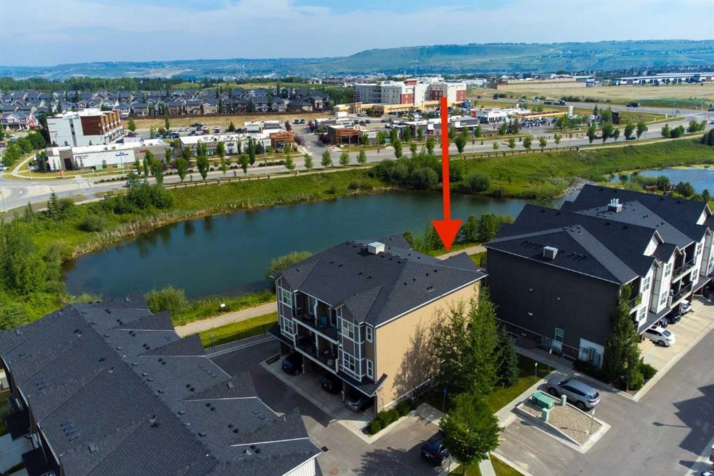 205-250 Fireside View, Cochrane, AB - Outdoor With Body Of Water With View