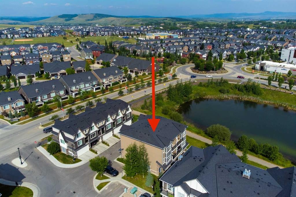 205-250 Fireside View, Cochrane, AB - Outdoor With Body Of Water With View