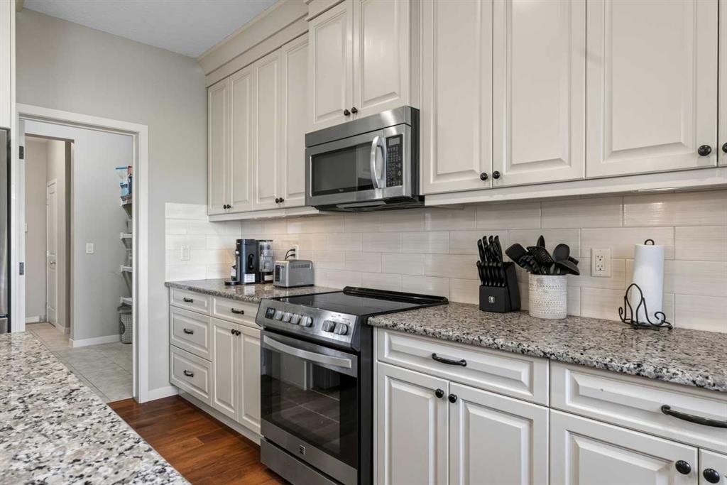 76 Auburn Glen Heights Se, Calgary, AB - Indoor Photo Showing Kitchen With Upgraded Kitchen