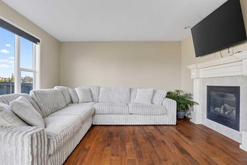 76 Auburn Glen Heights Se, Calgary, AB - Indoor Photo Showing Living Room With Fireplace