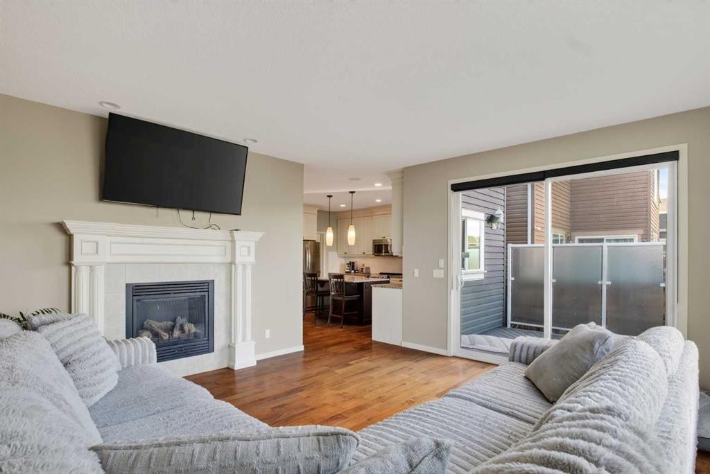 76 Auburn Glen Heights Se, Calgary, AB - Indoor Photo Showing Living Room With Fireplace