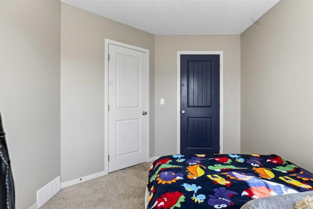 76 Auburn Glen Heights Se, Calgary, AB - Indoor Photo Showing Bedroom