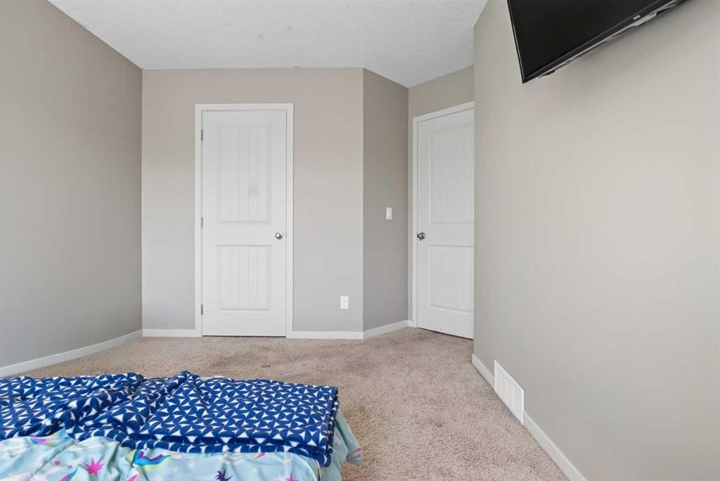76 Auburn Glen Heights Se, Calgary, AB - Indoor Photo Showing Bedroom