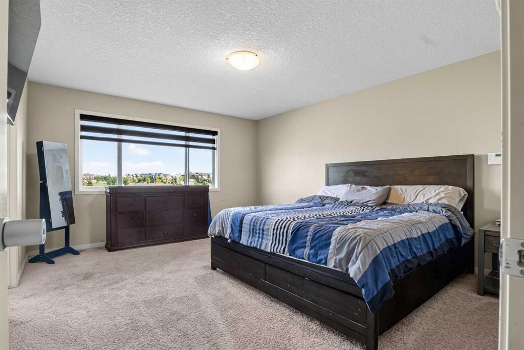 76 Auburn Glen Heights Se, Calgary, AB - Indoor Photo Showing Bedroom