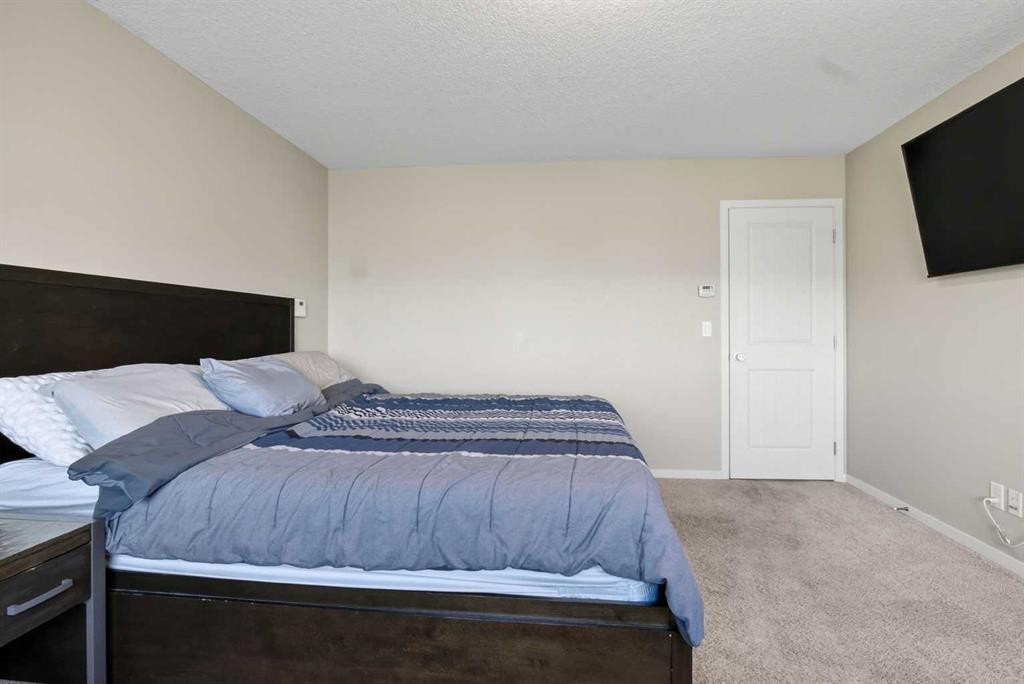 76 Auburn Glen Heights Se, Calgary, AB - Indoor Photo Showing Bedroom
