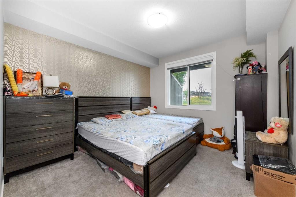 261 Redstone Street Ne, Calgary, AB - Indoor Photo Showing Bedroom