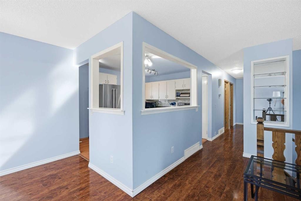 4 Arlington Bay Se, Calgary, AB - Indoor Photo Showing Other Room