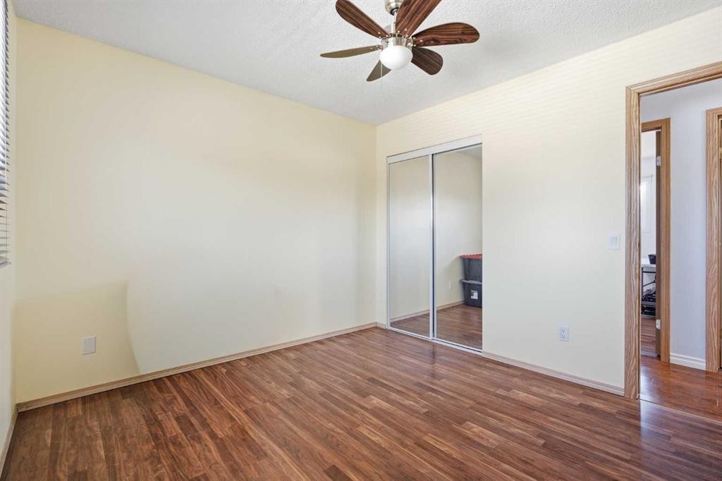4 Arlington Bay Se, Calgary, AB - Indoor Photo Showing Other Room