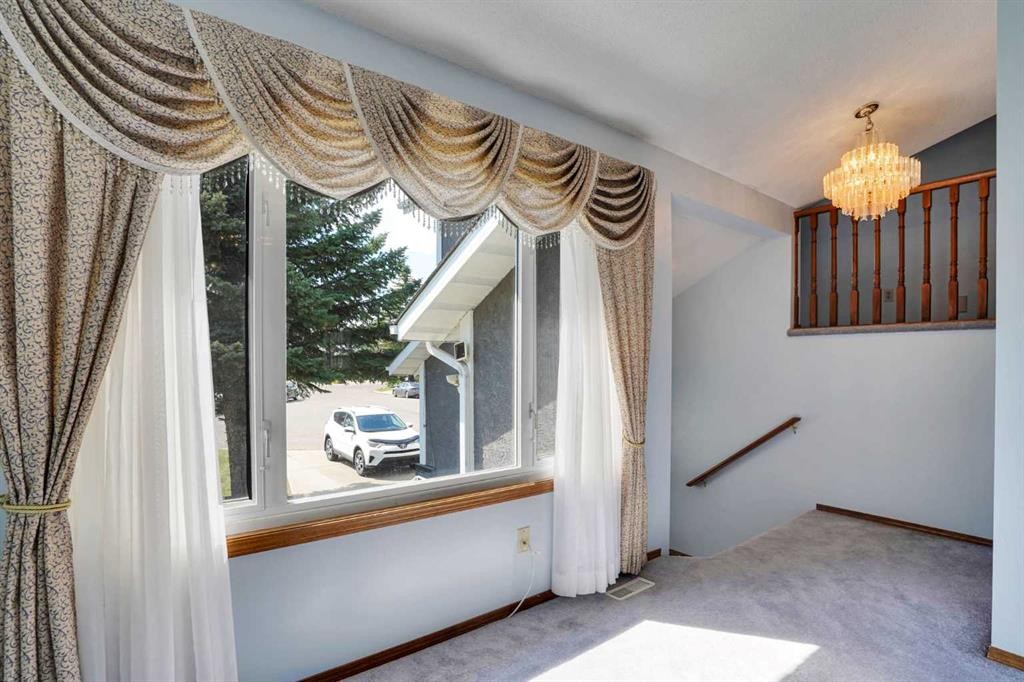 21 La Valencia Green Ne, Calgary, AB - Indoor Photo Showing Other Room