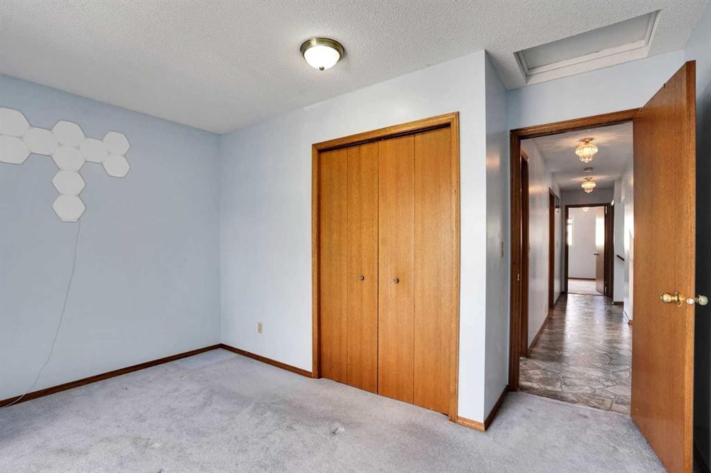 21 La Valencia Green Ne, Calgary, AB - Indoor Photo Showing Other Room