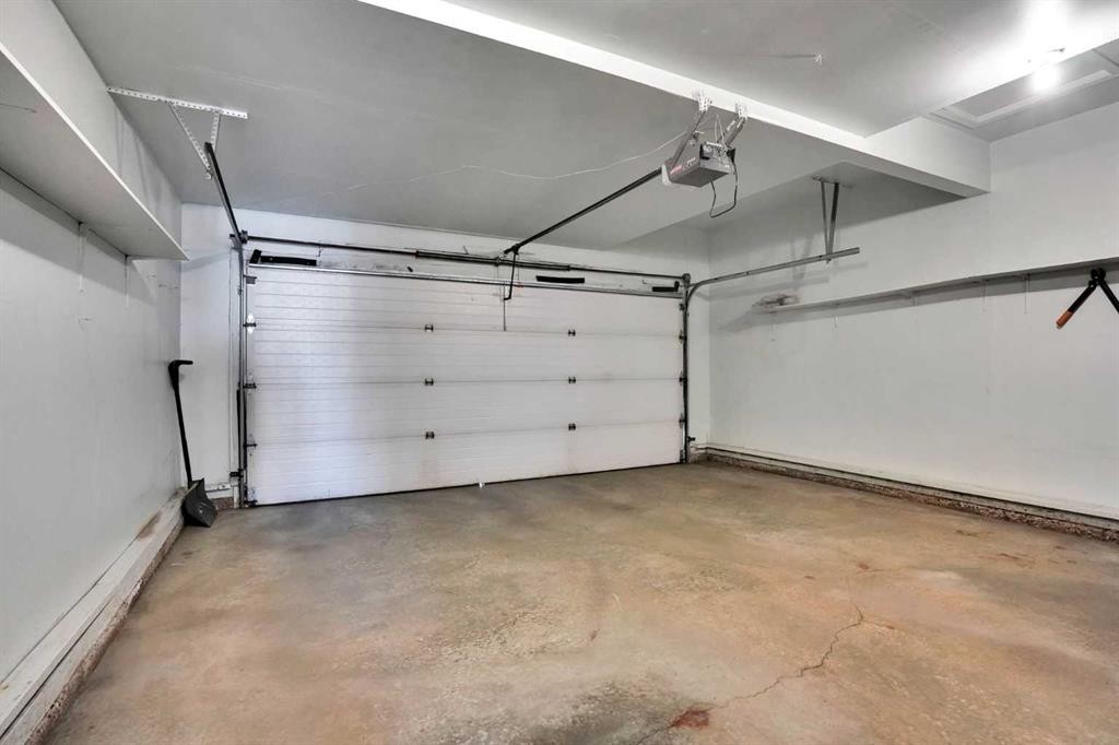 21 La Valencia Green Ne, Calgary, AB - Indoor Photo Showing Garage