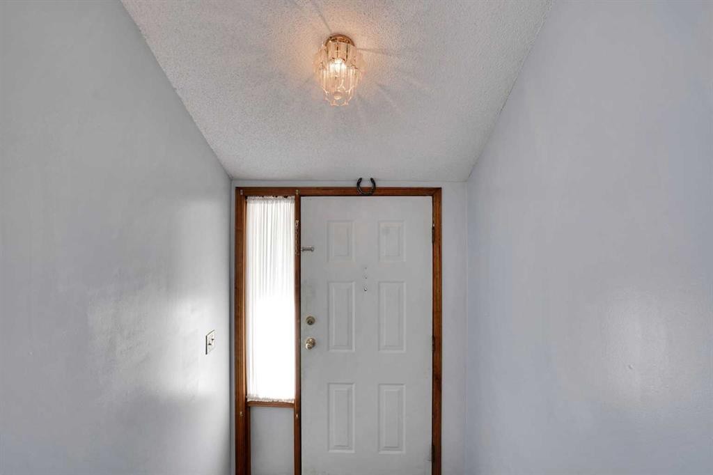 21 La Valencia Green Ne, Calgary, AB - Indoor Photo Showing Other Room