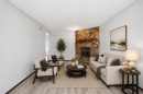 56 Pinecliff Close Ne, Calgary, AB  - Indoor Photo Showing Living Room With Fireplace 