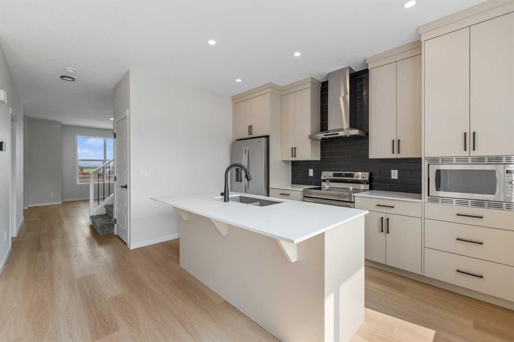 247 Lucas Gate Nw, Calgary, AB - Indoor Photo Showing Kitchen With Upgraded Kitchen