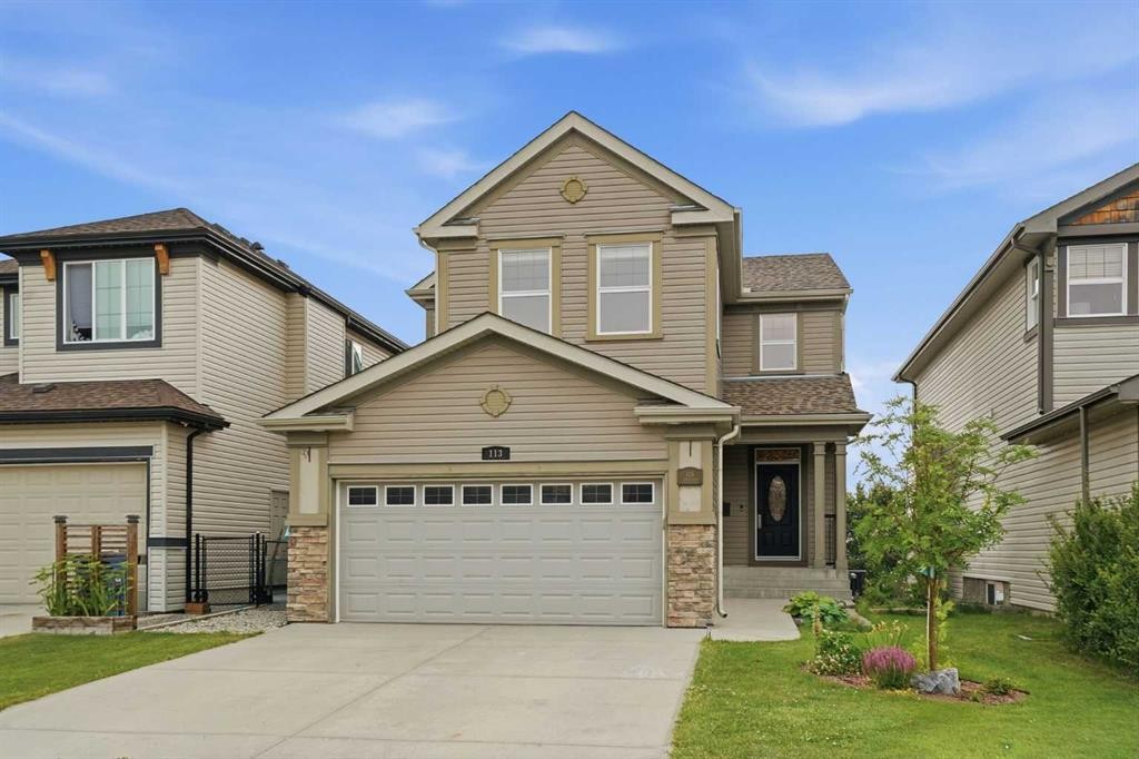 113 Sunset View, Cochrane, AB - Outdoor With Facade