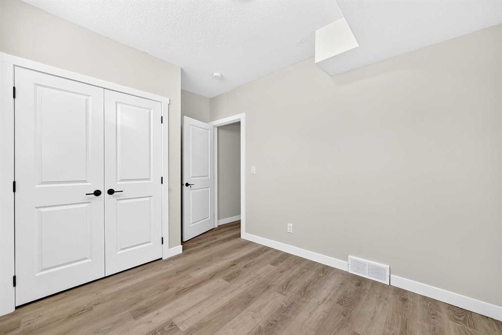 856 Midtown Drive Sw, Airdrie, AB - Indoor Photo Showing Other Room