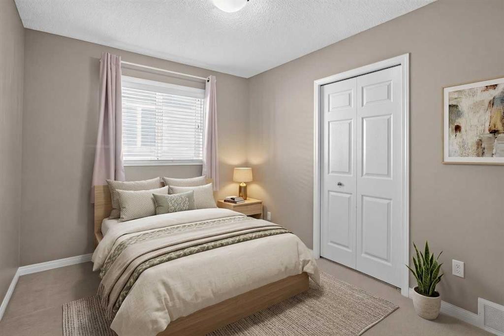 189 Bridleridge View Sw, Calgary, AB - Indoor Photo Showing Bedroom