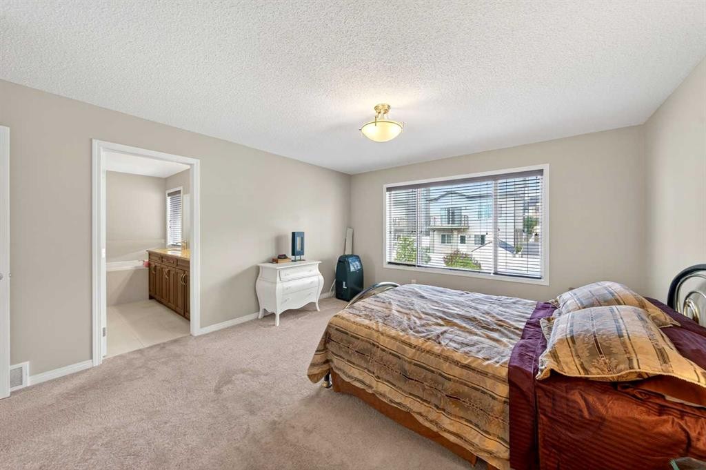 27 Panatella Row Nw, Calgary, AB - Indoor Photo Showing Bedroom