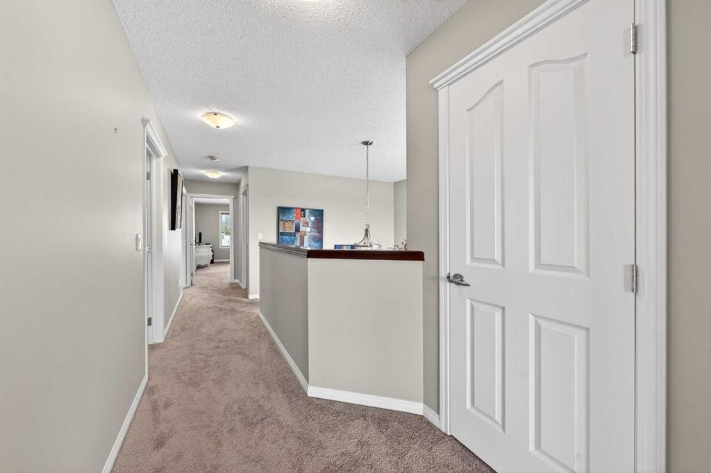 27 Panatella Row Nw, Calgary, AB - Indoor Photo Showing Other Room