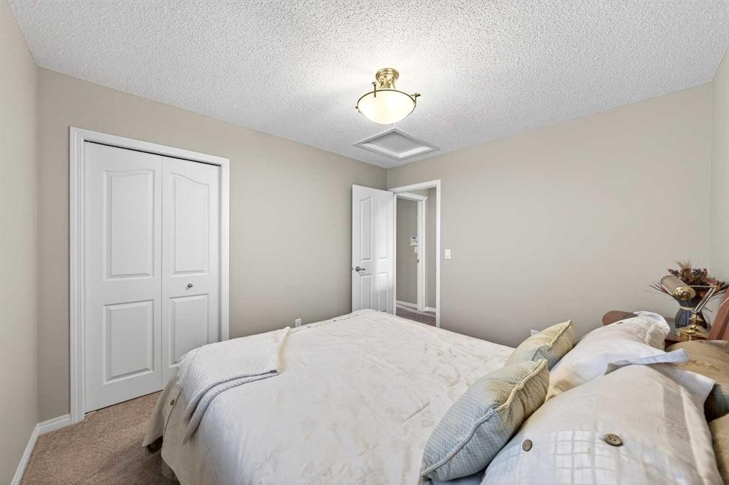 27 Panatella Row Nw, Calgary, AB - Indoor Photo Showing Bedroom